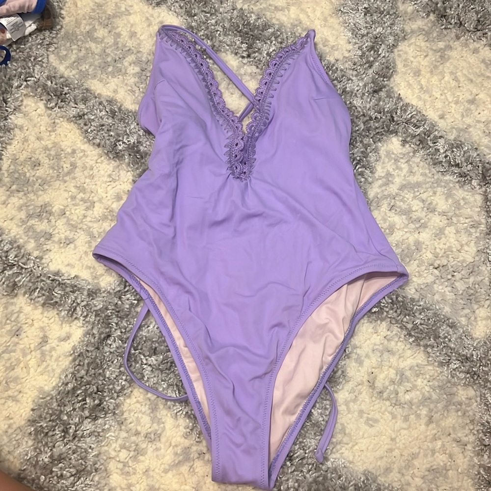 Purple one piece low cut bathing suit size medium